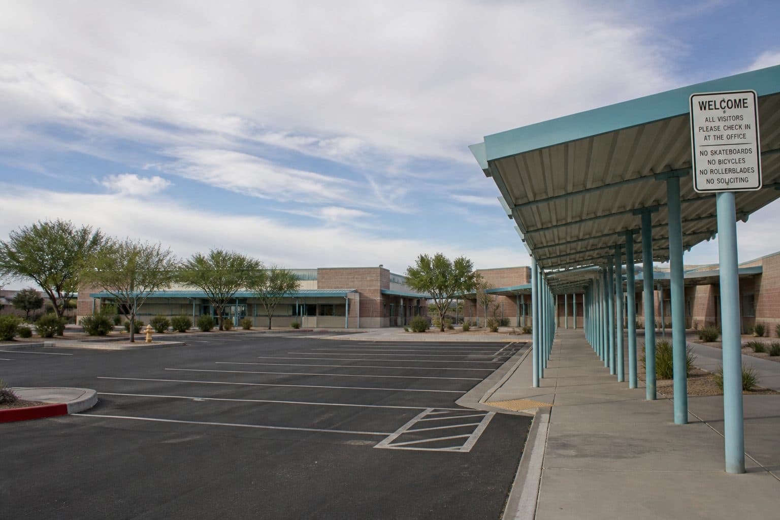 Empty Las Vegas elementary campus walkway and parking lot
