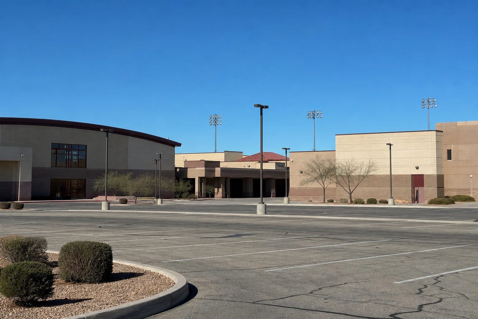 Henderson high school campus buildings and empty parking lot